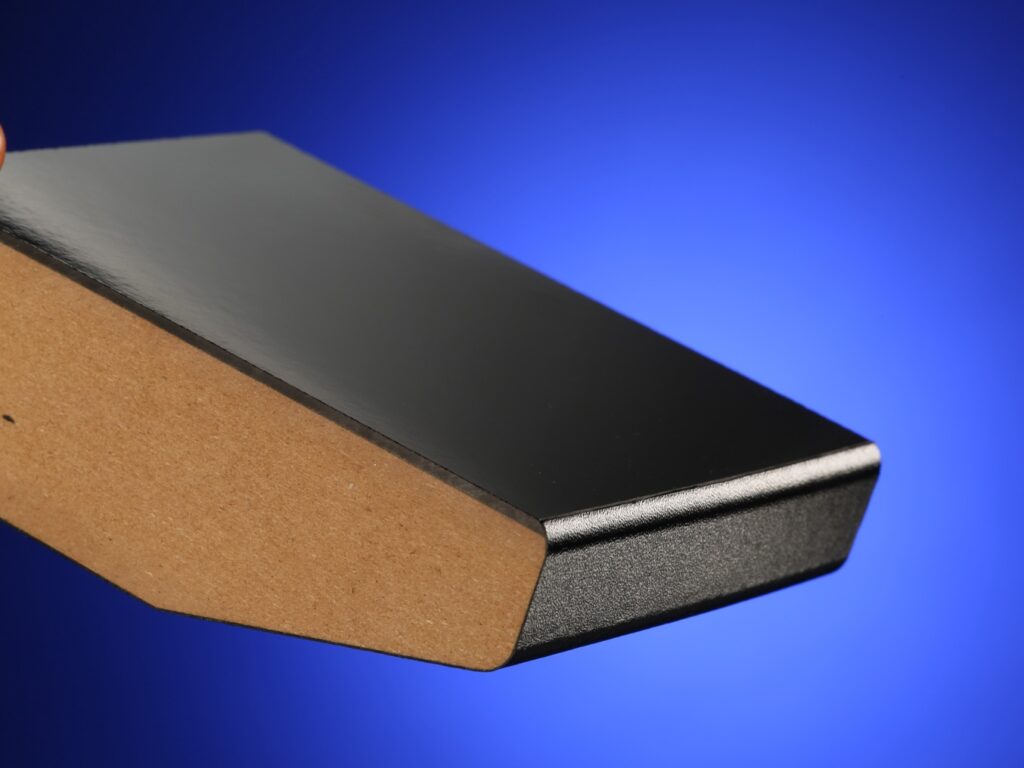 Close-up of a 3D laminated piece showing seamless profile and high-quality finish.