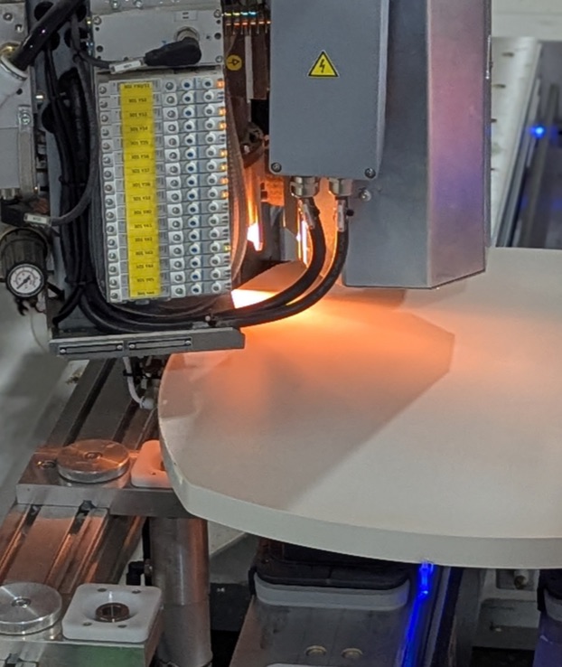 Laminate edgebanding being done on a machine at Paladin Industries