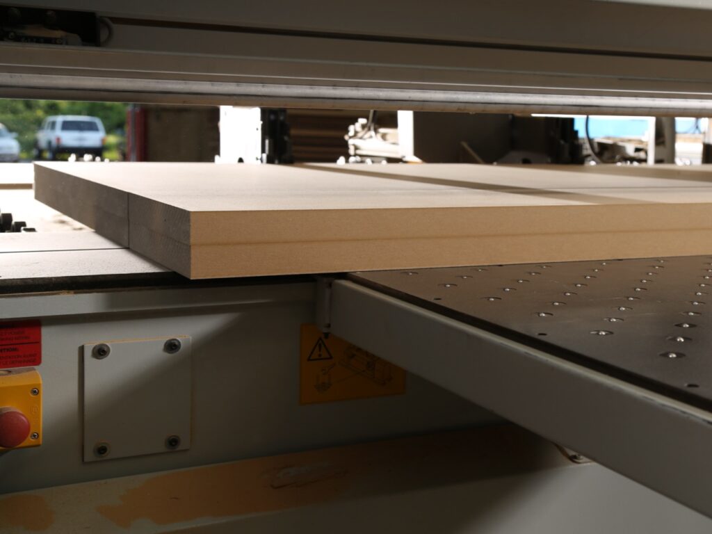 Closeup of wood materials on a machine