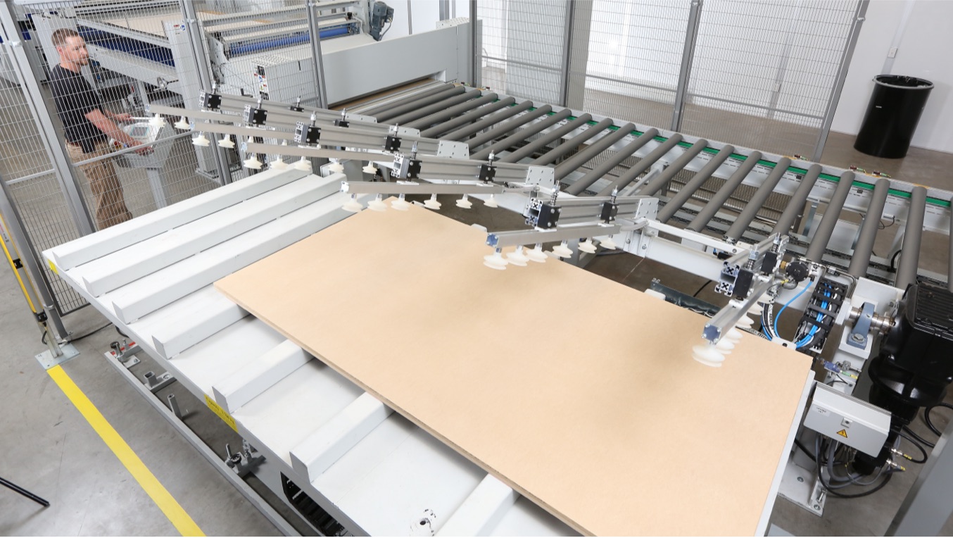 PUR lamination process showing automated loading and cleaning systems ensure uniform adhesion and finish quality.